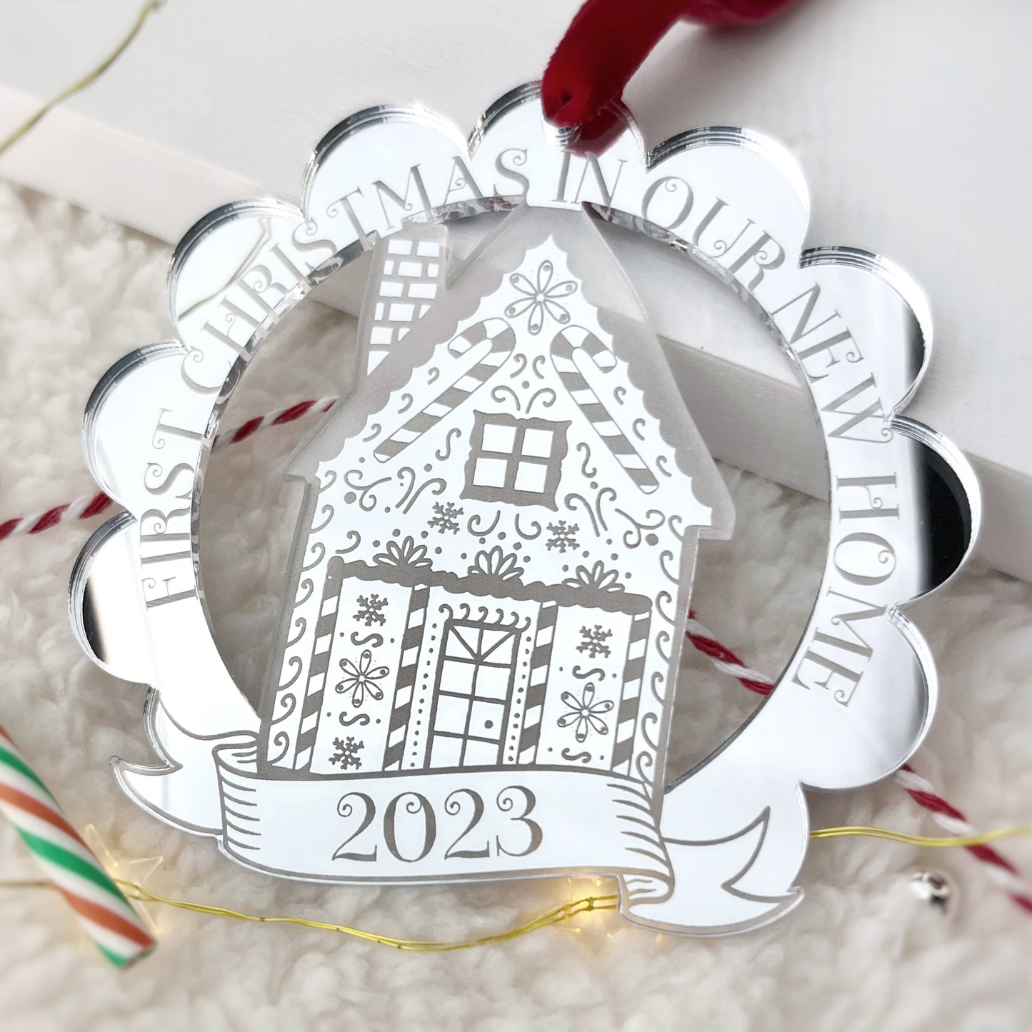 Gingerbread house Christmas tree ornament, a keepsake to celelbrate moving in to a new home. The Bespoke Workshop.