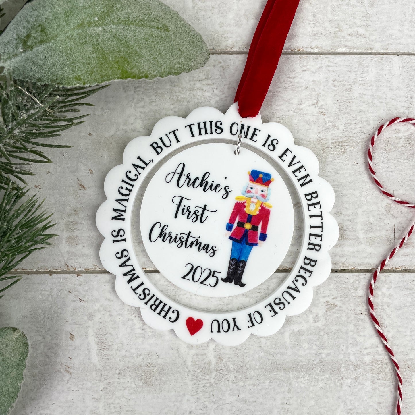 Scalloped edge white acrylic Nutcracker Christmas decoration 'Christmas is magical, but this one is even better because of you' 'First Christmas 2025'
