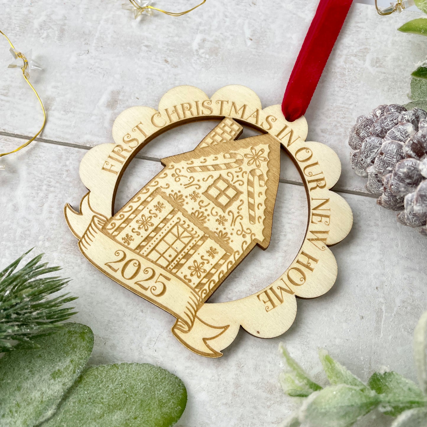 Laser engraved gingerbread house new home Christmas tree decoration. Designed and made by The Bespoke Workshop
