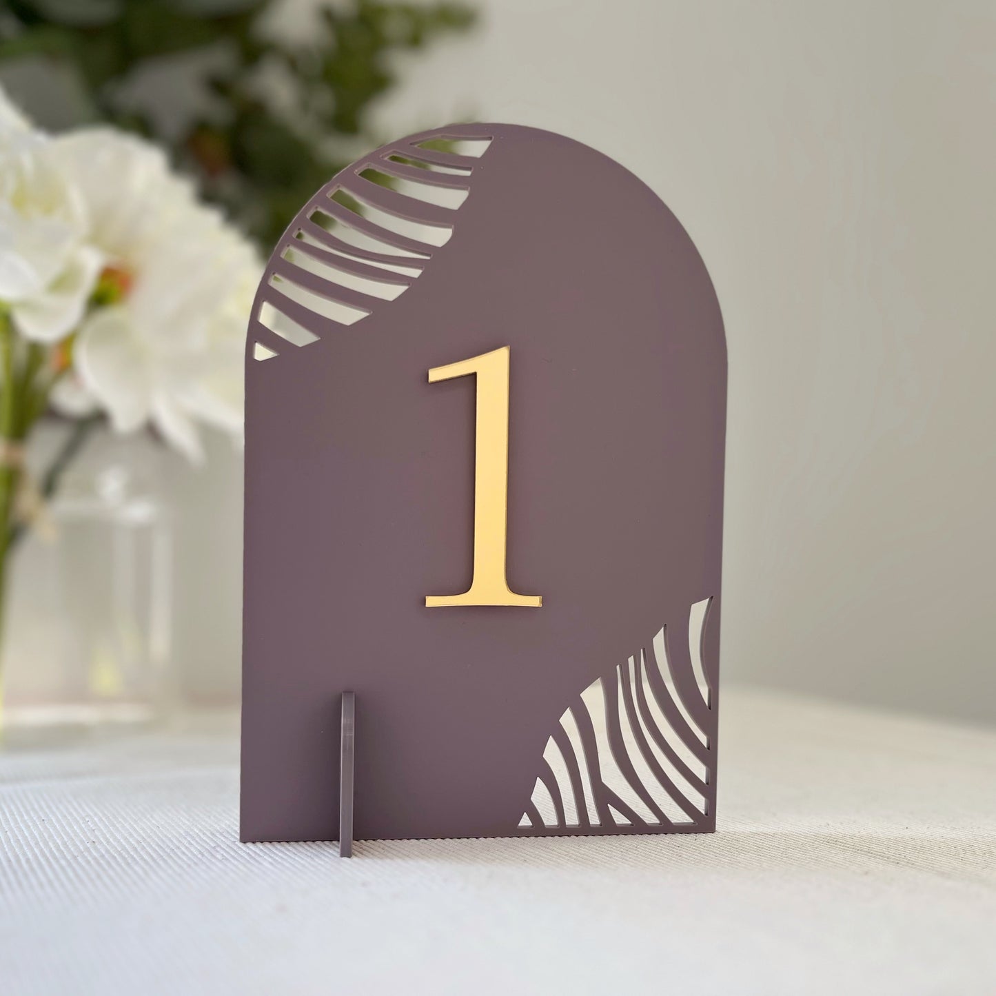 Laser cut arched mirrored table numbers for weddings by The Bespoke Workshop