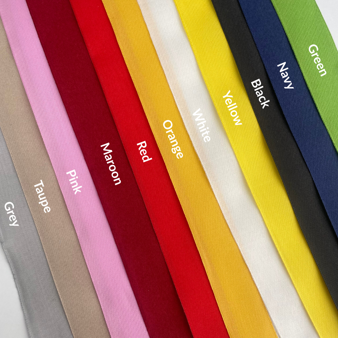Row of fabric swatches in various colors with labels on a white background