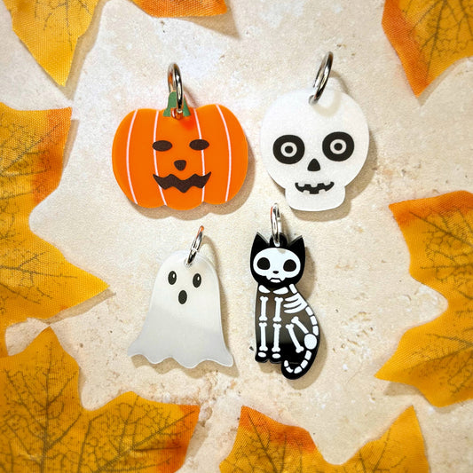 Cute acrylic Halloween pet charms, laser engraved by The Bespoke Workshop