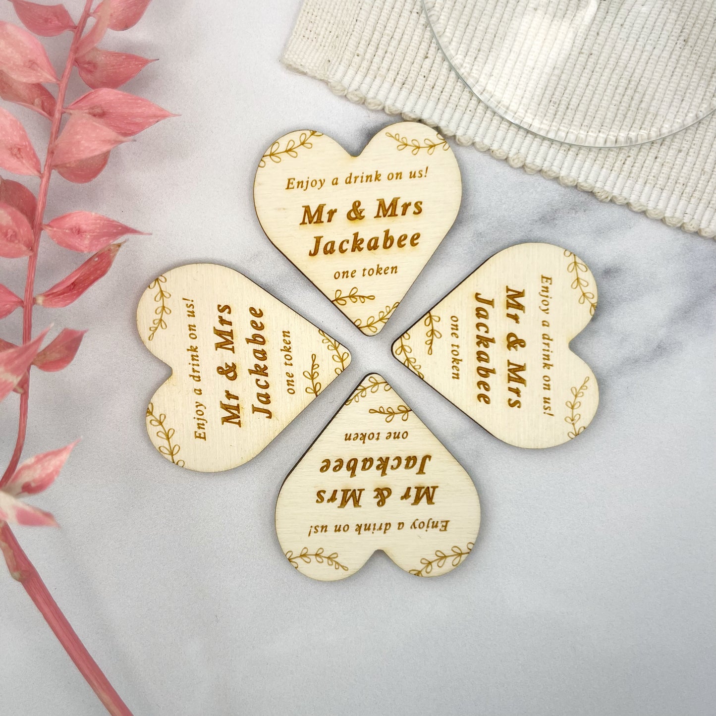 Heart shaped free drinks wedding tokens can be personalised by laser engraving The bespoke workshop