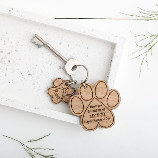 Laser engraved wooden keyring, a gift from your dog, Paw print keyring engraved with 'Thank you for picking up my poo, Happy Father's Day!' Made by The Bespoke Worksho