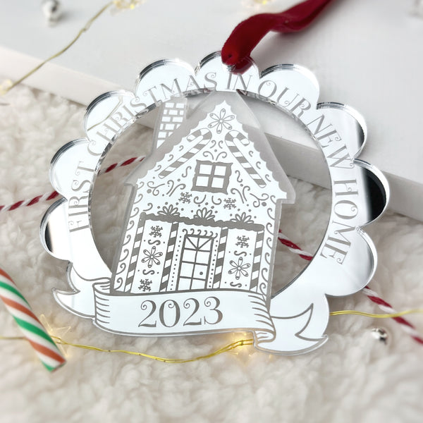 Celebrate christmas in a new home with this hanging tree decoration, engraved with the wording 'First Christmas in our new home' and the year. The Bespoke Workshop