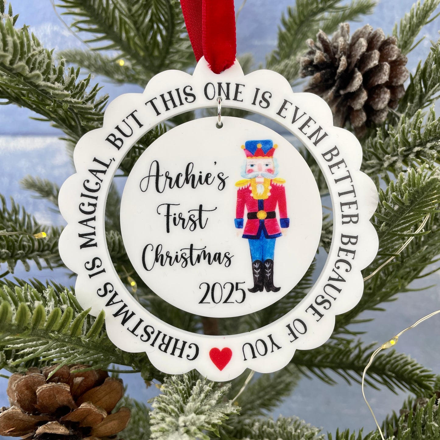 Scalloped edge white acrylic Nutcracker Christmas decoration 'Christmas is magical, but this one is even better because of you' 'First Christmas 2025' 