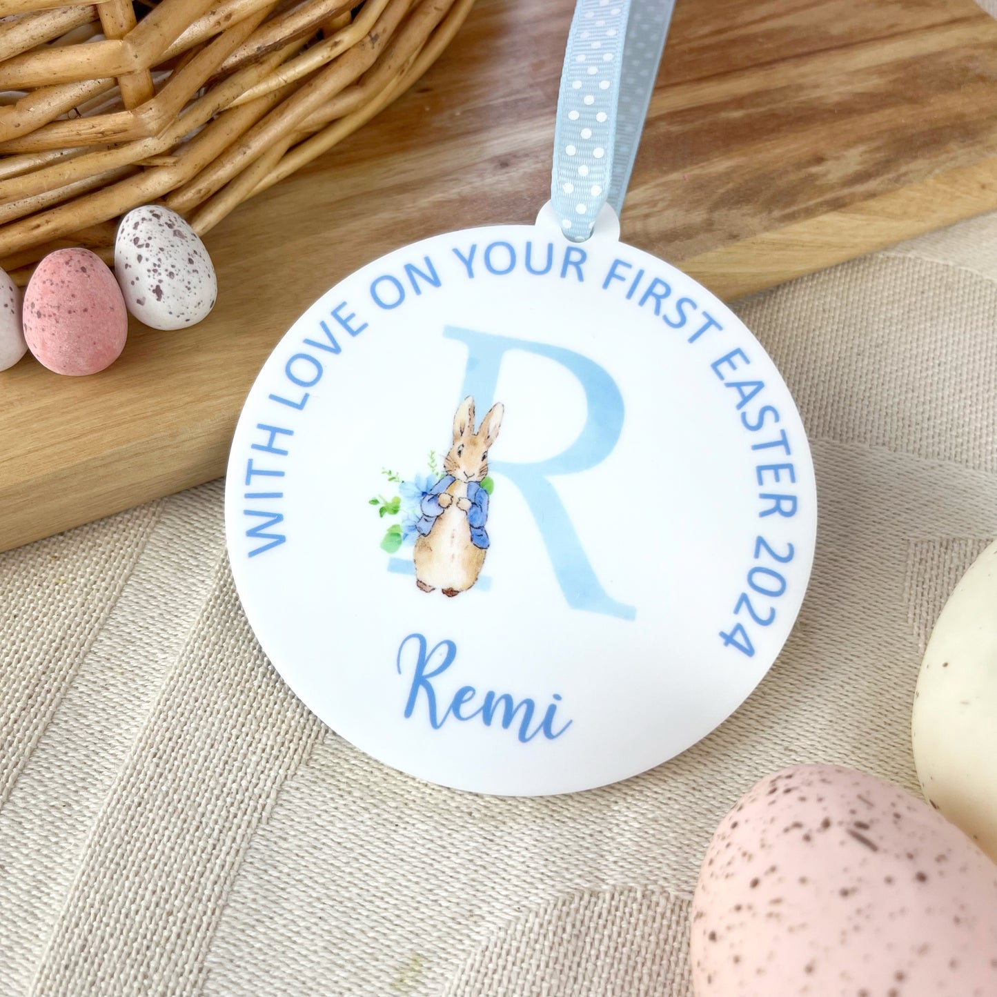 Baby's My First Easter Keepsake Decoration with Personalised name and wording, illustrated with a blue watercolour of Peter Rabbit