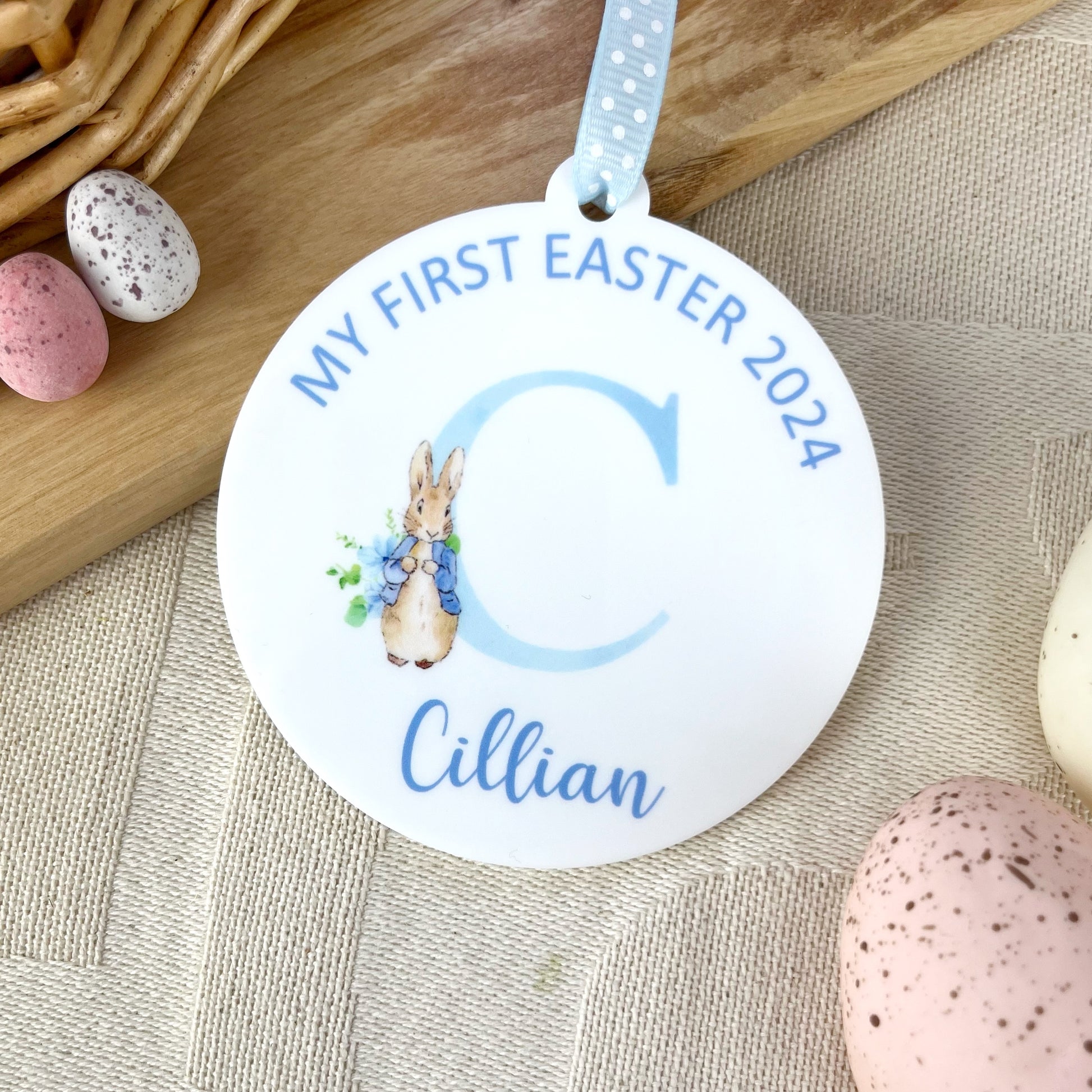 'My First Easter 2024' Hanging Blue Keepsake Decoration with Personalised name and wording, illustrated with a watercolour of Peter Rabbit