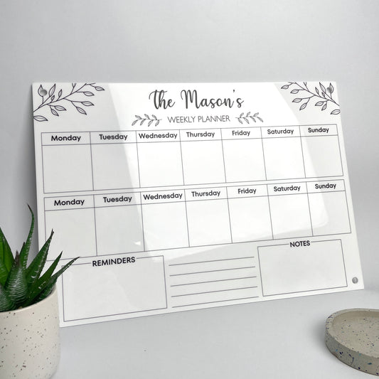 Weekly planner with 'The Mason's' personalised name at the top - white acrylic with black text 