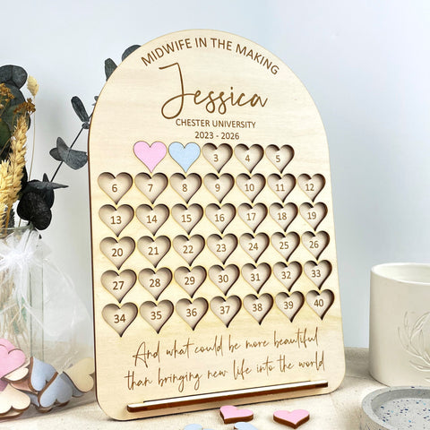 Student Midwife Birth Counting Board, personalised by engraving names of the student and completed with 40 coloured hearts. The Bespoke Workshop