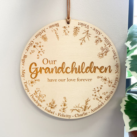 Grandparent plaque engraved with many names of their grandchildren. Made by The Bespoke Workshop