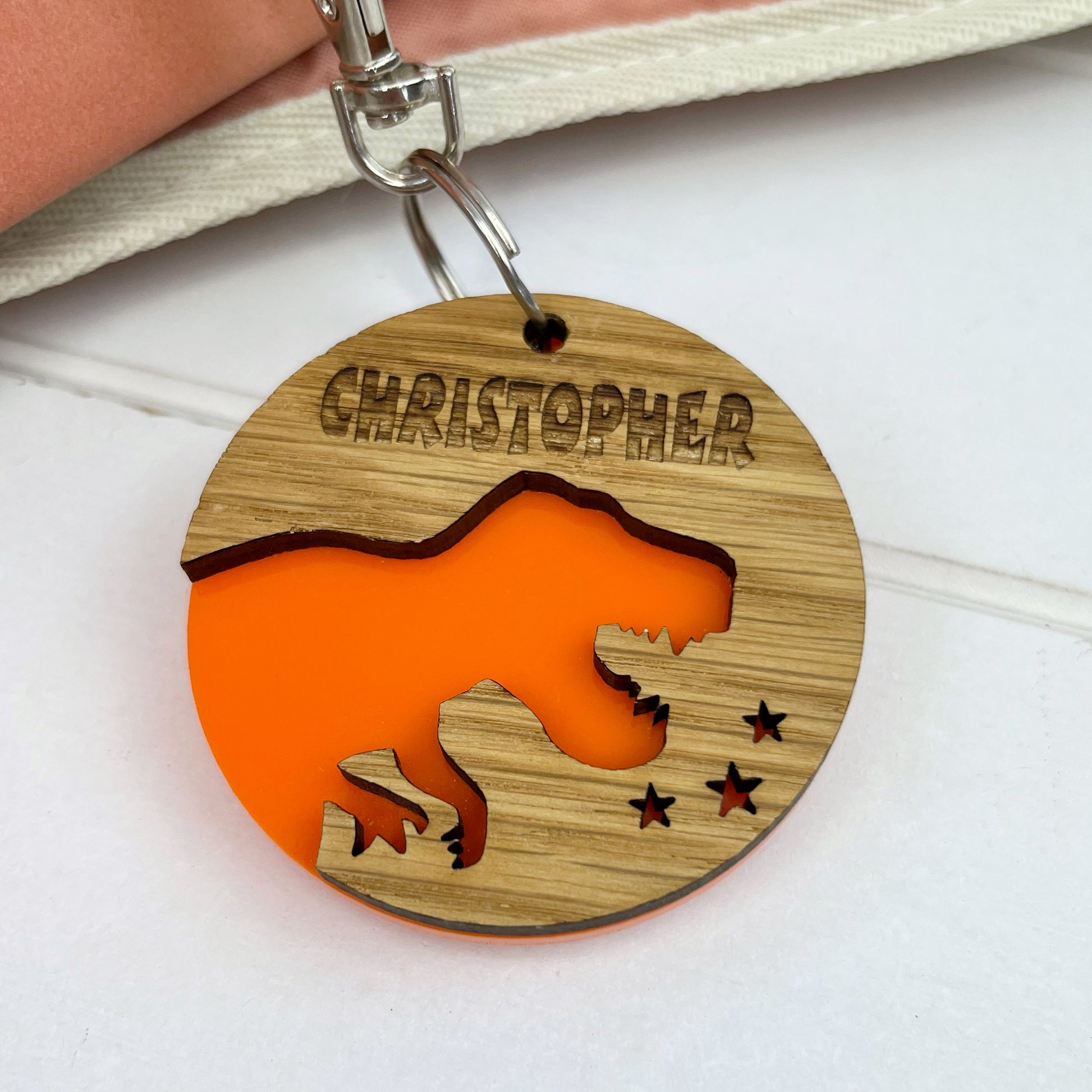 Colouful Name Dinosaur Keyring for Children going back to school, Personalised with an engraved name - The Bespoke Workshop