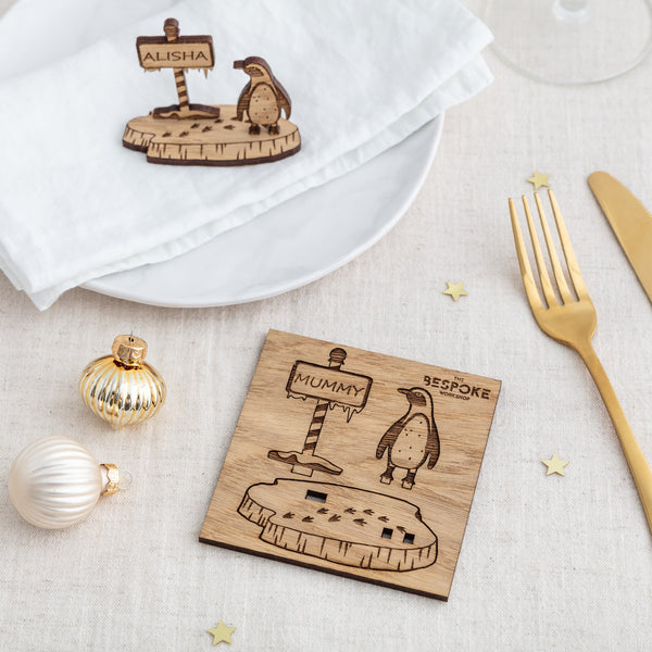 Wooden penguin place setting